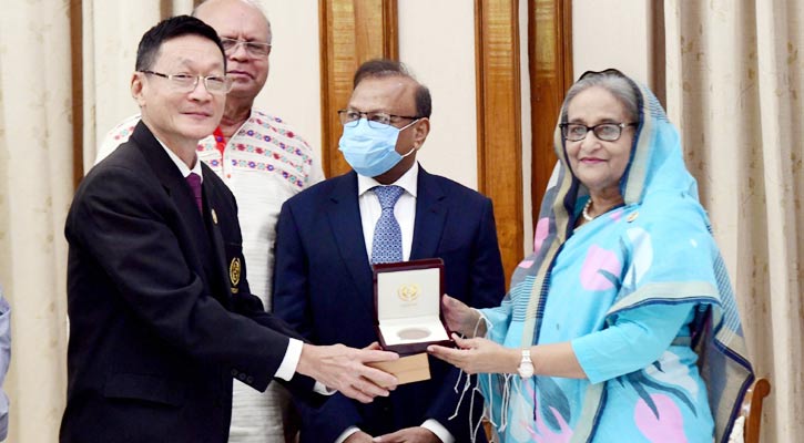 PM receives Azizul Haque Rural Development Award