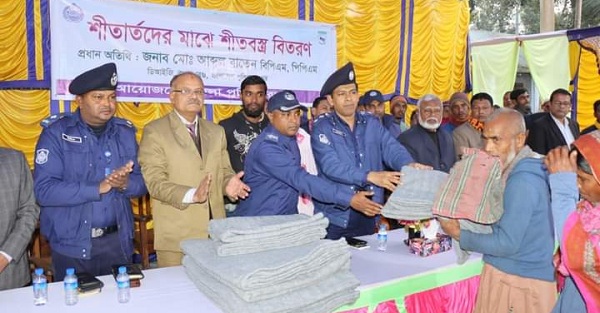 Community policing meeting and distribution of winter clothes to the needy at Taraganj Police Station, Rangpur.