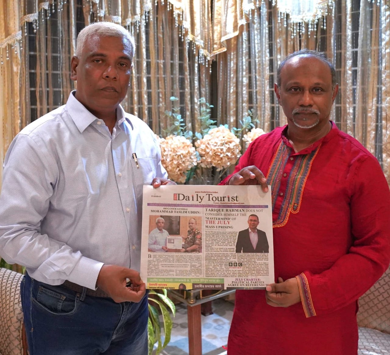 Abu Mohammad Nipar Receives a Copy of the International English Daily The Daily Tourist